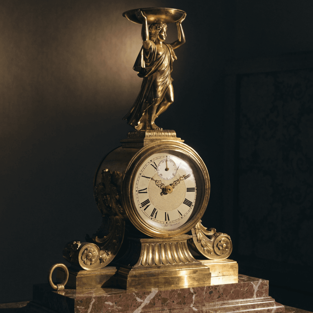 Pendule Empire en bronze doré