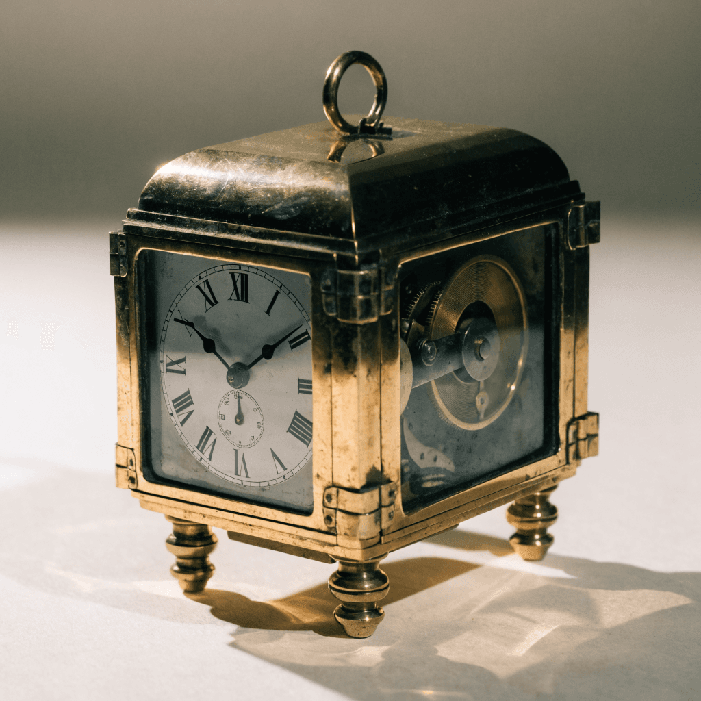 Pendulette de voyage en laiton